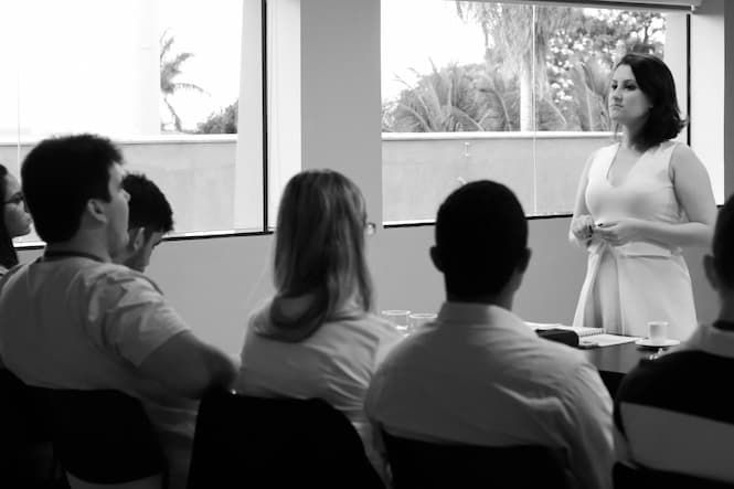 student presenting in front of class