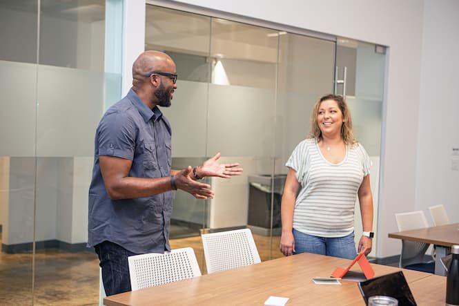 four people in conversation